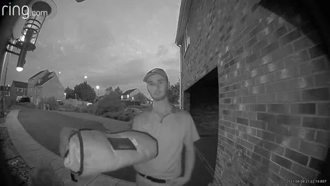 Pizza Delivery Guy at Wrong Address Runs Away, Consett, Durham, UK - 08 Aug 2021 Stock Footage 205394334