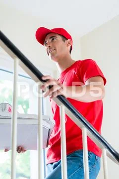 Pizza delivery man with boxes Stock Photos