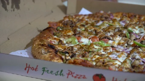 Pizza delivery in open box closeup Stock Footage 103341159