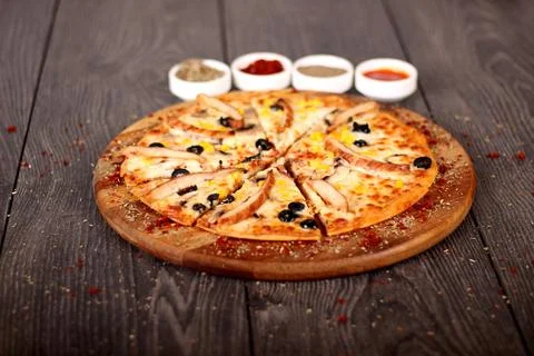 Pizza with different spices Stock Photos