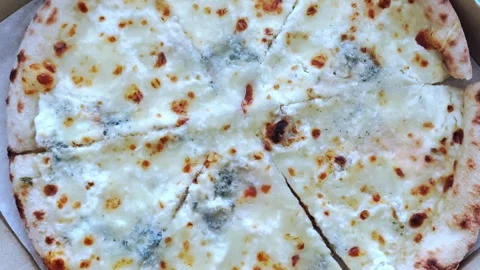 Pizza with different types of cheese. Pizza background. Italian pizza. Stockbeeldmateriaal 279757812