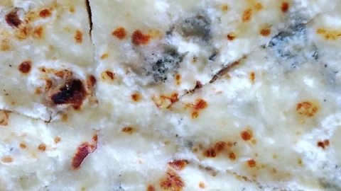 Pizza with different types of cheese. Pizza background. Italian pizza. Stock Footage 279993391