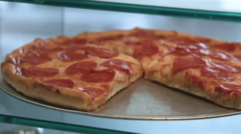 Pizza on display at a pizzeria Stock-Footage 64890627