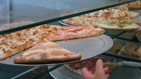 Pizza on display at a pizzeria Stock Footage 64892018