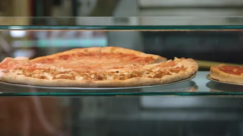 Pizza on display at a pizzeria Stock Footage 64892091