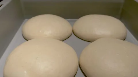 Pizza dough balls in a container 스톡 동영상 260450926