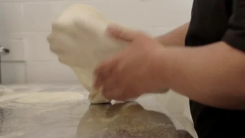 Pizza dough being tossed  Stock Footage 245469192