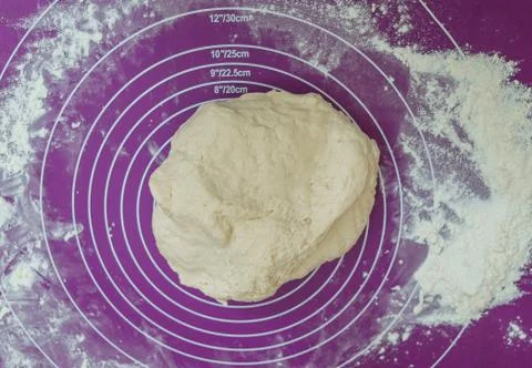 Pizza dough on the table close up. Stock Photos