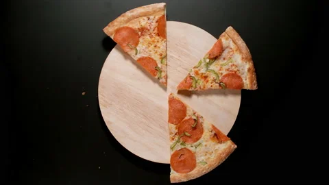 Pizza Is Eaten Up Random On The Table, Black Background Видео 147109240