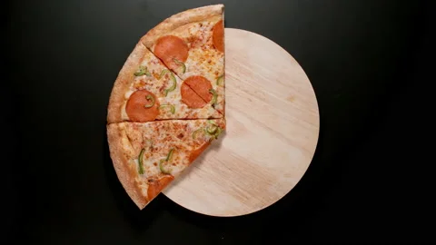 Pizza Is Eaten Up On The Table, Black Background Stock Footage 147109243