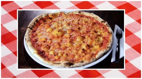 Pizza edited sequence over red tablecloth background Video stock 34720196