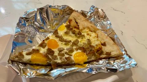 Pizza on foil 写真素材
