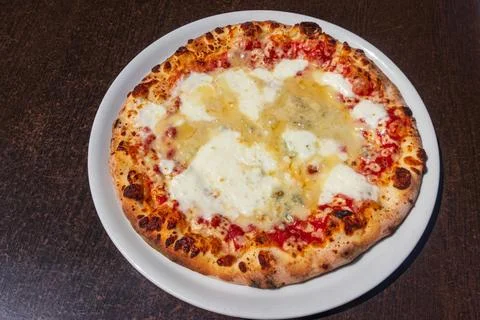 Pizza Four cheese on a table Stock Photos
