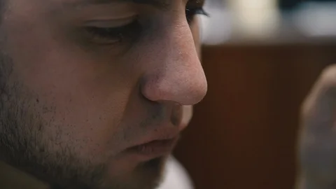 Pizza. The guy is eating pizza. Stock Footage 122886335