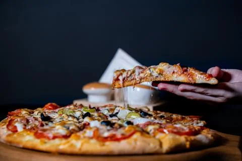 Pizza up hads Stock Photos