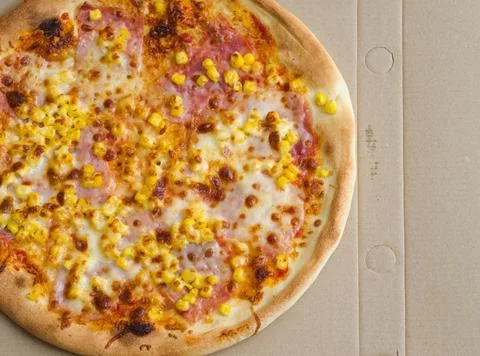 Pizza with Ham and Corn Stock Photos