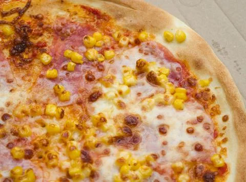Pizza with Ham and Corn Stock Photos