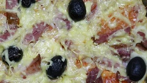 Pizza with ham and olives Stock Footage 124364022