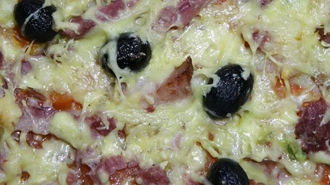 Pizza with ham and olives Stock Footage 124364572