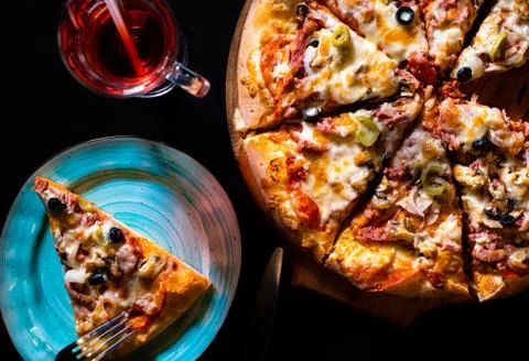 Pizza hand background Stock Photos