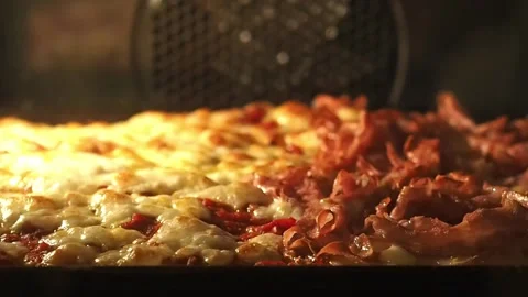 Pizza home in oven Stock Footage