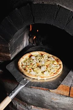 Pizza inside the oven. Stock Photos