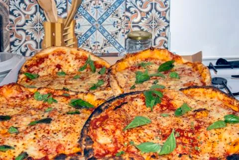 Pizza in the kitchen Stock Photos