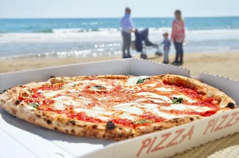 Pizza lies on the table Stock Photos