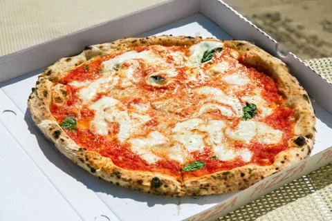 Pizza lies on the table Stock Photos