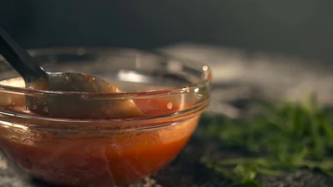 Pizza maker spreading Tomato Sauce Stock Footage 74491285