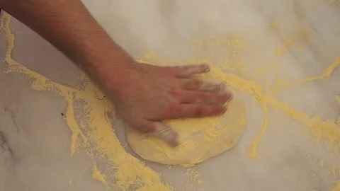 Pizza master opens dough to make pizza Stock Footage 102415576