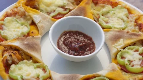 Pizza Mexican hat on a white plate Stock Footage