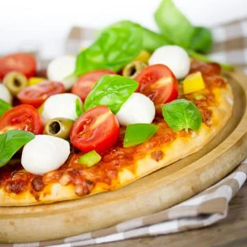 Pizza with mozzarella Stock Photos