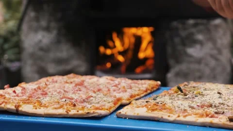 Pizza before an open fire Stock Footage 220150557