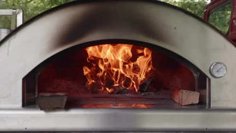 Pizza oven with burning fire Stock Footage 169660327