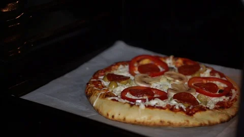 Pizza in the oven for cooking Stock Footage 105204895