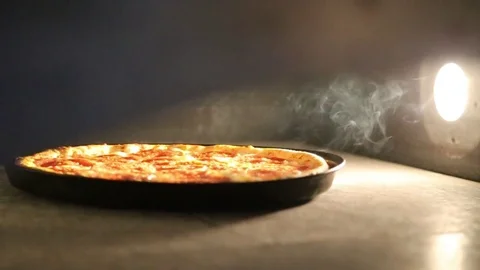 Pizza in the oven Stock Footage 83546022