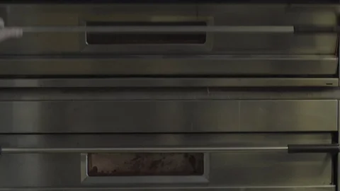 Pizza in the oven Stock Footage 86170105