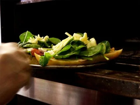 Pizza from the oven Stock Photos