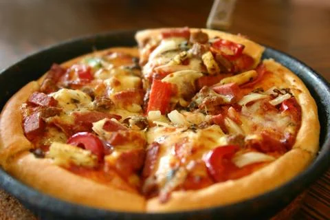 Pizza in pan Stock Photos