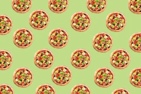 Pizza pattern design on pale green background Stock Photos