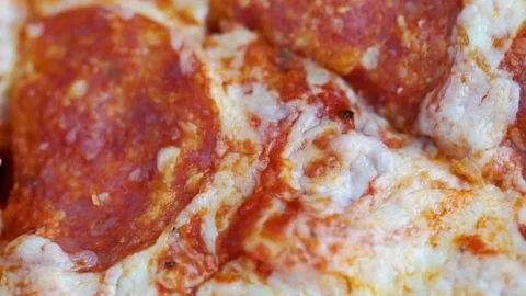Pizza pepperoni rotating Stock Footage