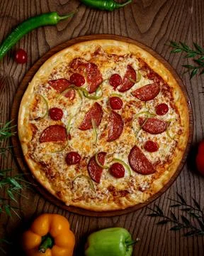 Pizza pepperoni on the table 写真素材