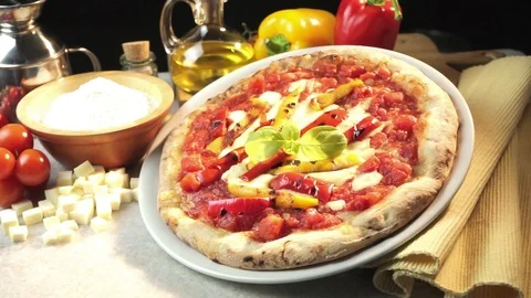 Pizza with peppers  on the table Video stock 85595654