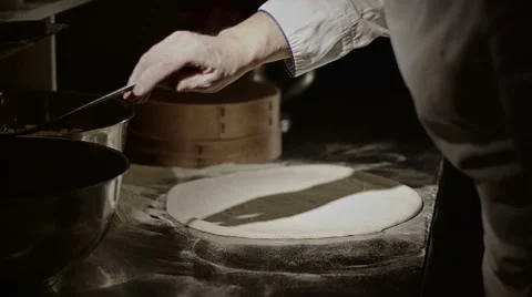 Pizza placing ingredients Stock Footage 49120582