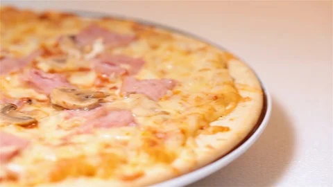 The pizza on the plate. Close up. Slider Stock Footage 100742252