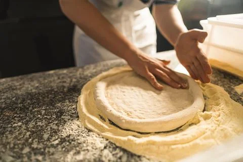 Pizza Process Dough Preparation Close-up shots of the hands kneading and Stock Photos