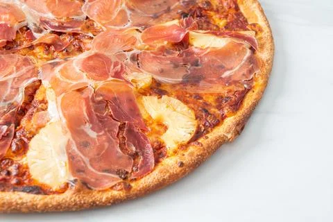 Pizza with prosciutto or parma ham pizza Stock Photos