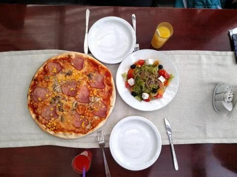 Pizza in restaurant Stock Photos