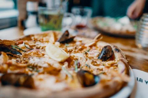 Pizza at a restaurant Stock Photos